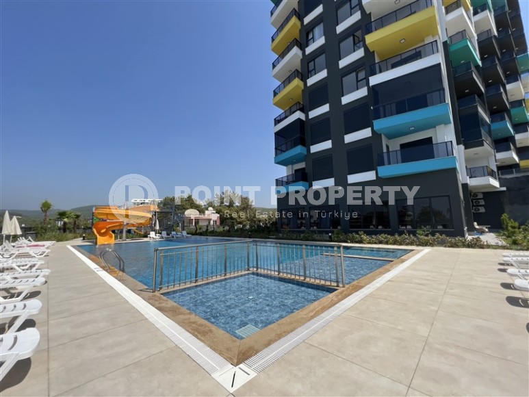 Новая квартира с чистовой отделкой в 1400 метрах от моря, в спокойном районе Аланьи - Авсаллар-id-6796-фото-17