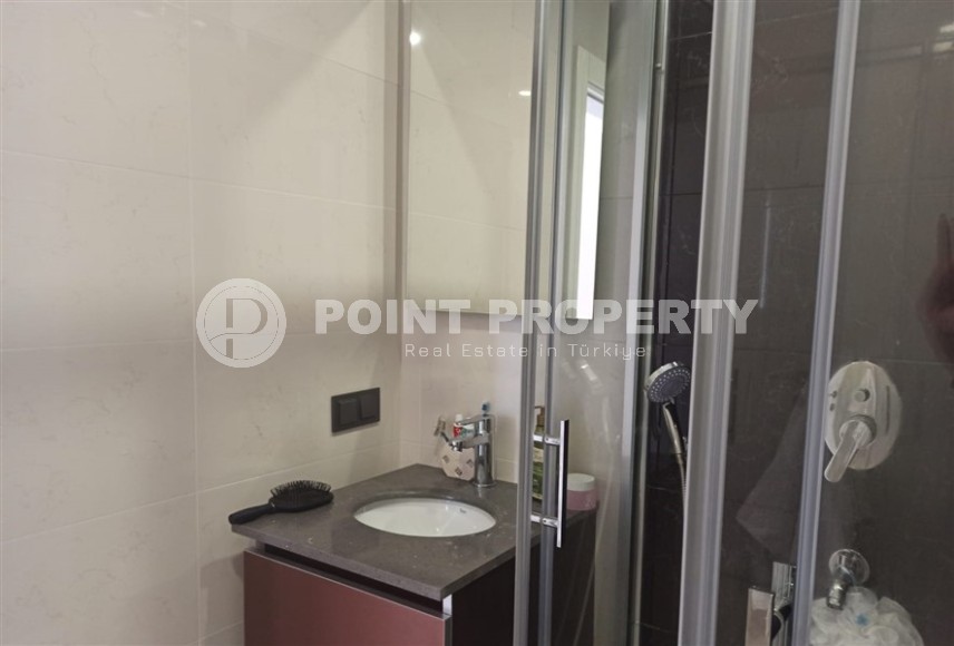 Комфортабельная квартира с мебелью и бытовой техникой в 450 метрах от пляжа, в центре района Махмутлар-id-6801-фото-11