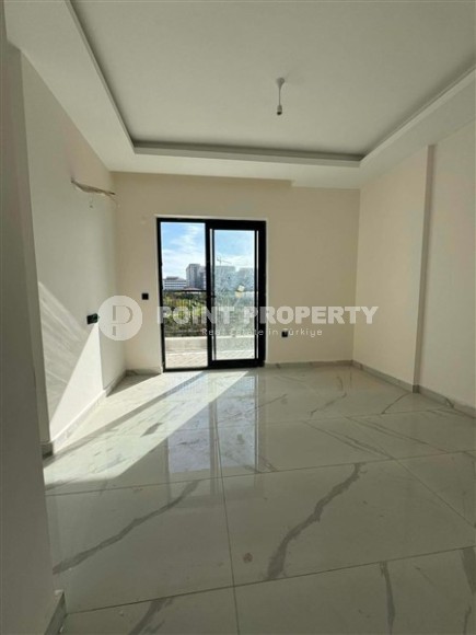 New apartment with fine finishing 550 meters from the sea, in the modern area of Alanya - Mahmutlar-id-6804-photo-3