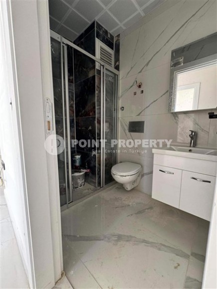 New apartment with fine finishing 550 meters from the sea, in the modern area of Alanya - Mahmutlar-id-6804-photo-4