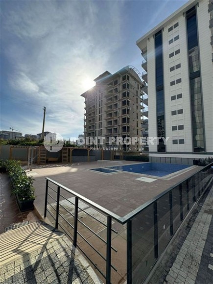 New apartment with fine finishing 550 meters from the sea, in the modern area of Alanya - Mahmutlar-id-6804-photo-5