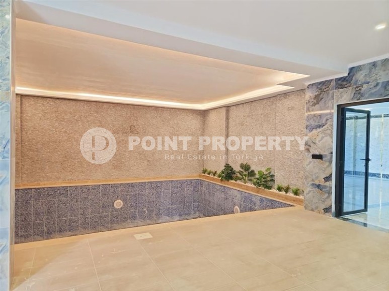 New apartment with fine finishing 550 meters from the sea, in the modern area of Alanya - Mahmutlar-id-6804-photo-11