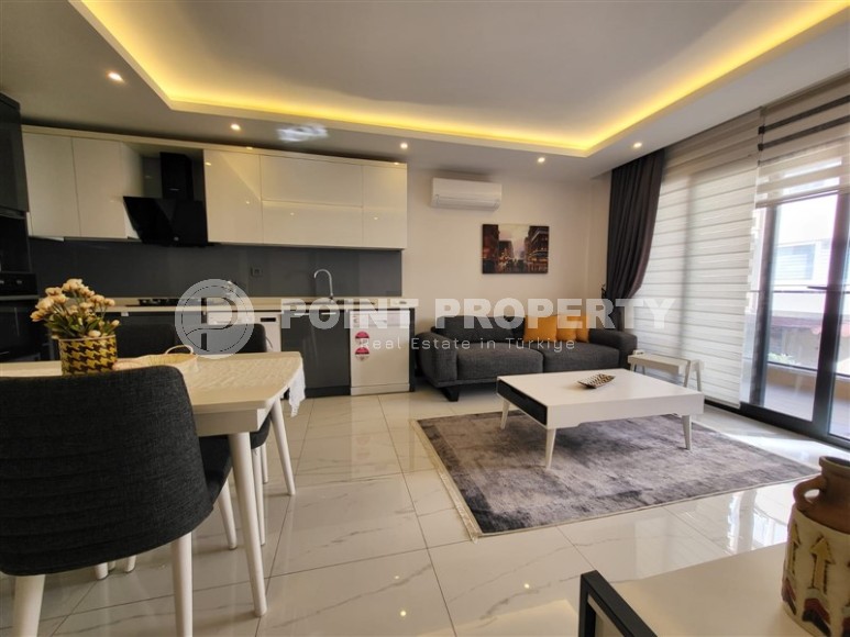 Apartment with modern design, furniture and new appliances, 850 meters from the sea, in the center of Alanya-id-6818-photo-1