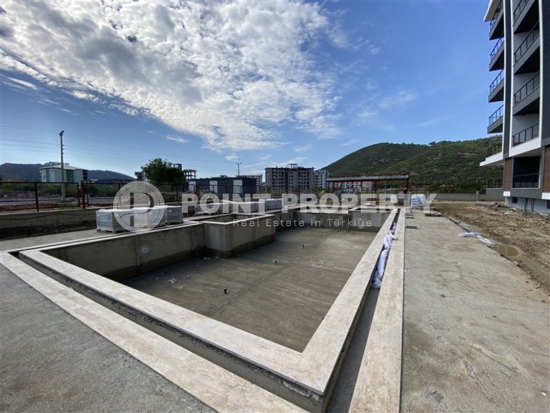 Квартира в резиденции на финальной стадии строительства в зеленом, экологически чистом районе Аланьи - Газипаша-id-6824-фото-12