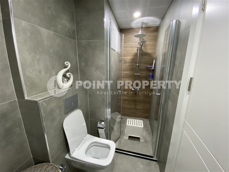 Modern apartment with furniture and household appliances, one and a half kilometers from the sea, in the picturesque area of Alanya - Hasbahce-id-6826-photo-9