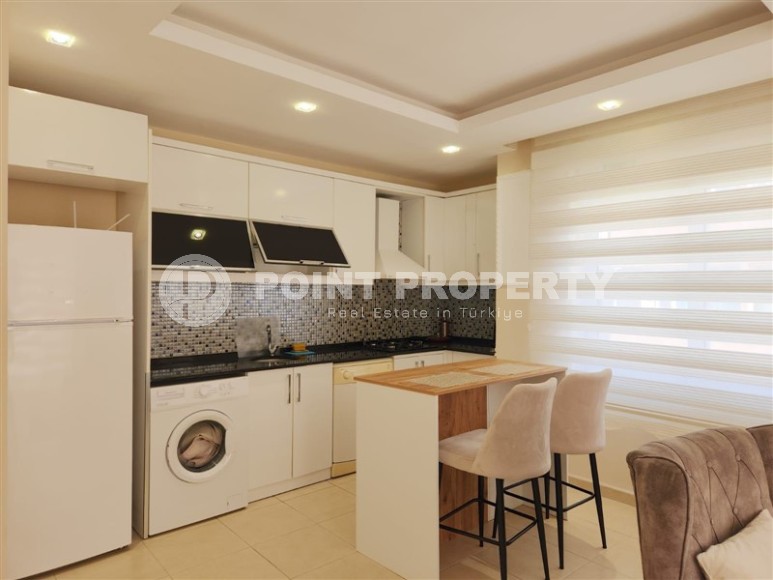 Bright, comfortable apartment with modern design, 500 meters from the sea, in the center of Mahmutlar-id-6831-photo-4