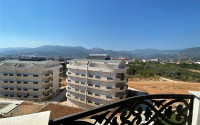 New view three-room apartment, 85m² at the foot of the mountains in Upper Oba, Alanya-id-1535-photo-1