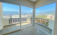 New view three-room apartment, 85m² at the foot of the mountains in Upper Oba, Alanya-id-1535-photo-3