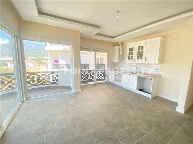 New view three-room apartment, 85m² at the foot of the mountains in Upper Oba, Alanya-id-1535-photo-4