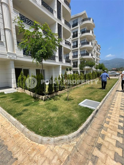 New view three-room apartment, 85m² at the foot of the mountains in Upper Oba, Alanya-id-1535-photo-11