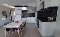 Spacious two-level apartment with mountain views, on the 5th floor with an attic, in the center of the Kestel district-id-6844-photo-5