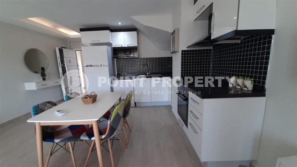 Spacious two-level apartment with mountain views, on the 5th floor with an attic, in the center of the Kestel district-id-6844-photo-5