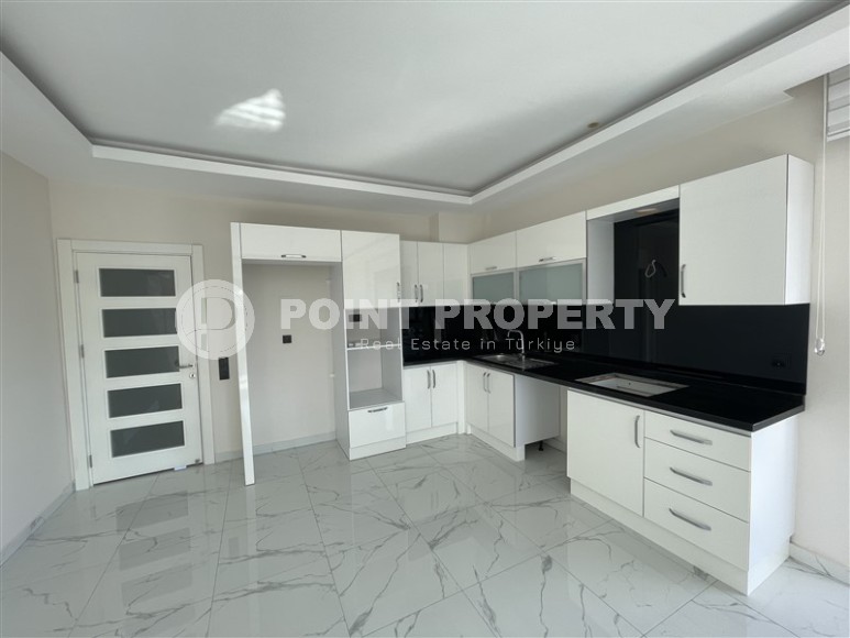 Spacious 2+1 apartment with views of the Taurus Mountains, on the 5th floor in a modern residence built in 2020-id-6851-photo-2