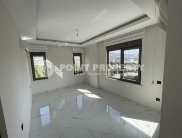 Spacious 2+1 apartment with views of the Taurus Mountains, on the 5th floor in a modern residence built in 2020-id-6851-photo-3