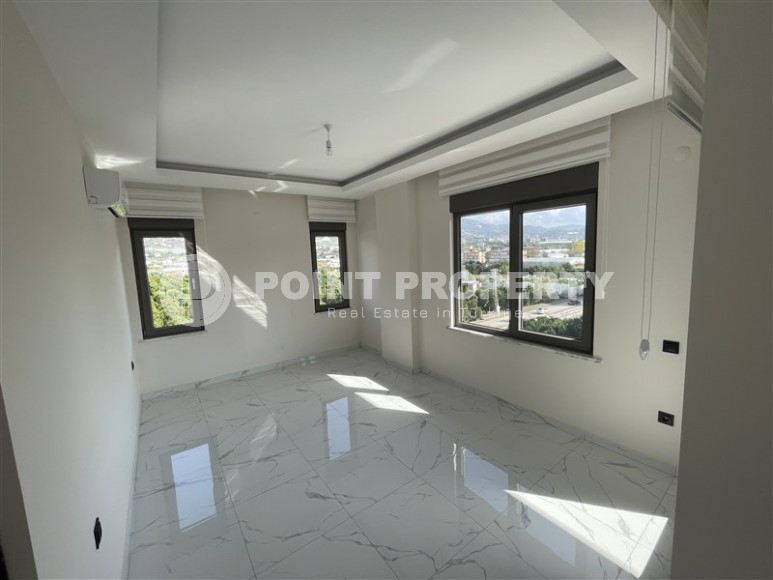 Spacious 2+1 apartment with views of the Taurus Mountains, on the 5th floor in a modern residence built in 2020-id-6851-photo-3