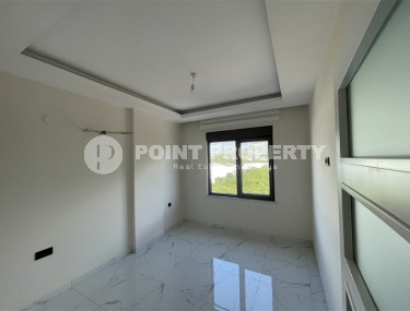 Spacious 2+1 apartment with views of the Taurus Mountains, on the 5th floor in a modern residence built in 2020-id-6851-photo-5