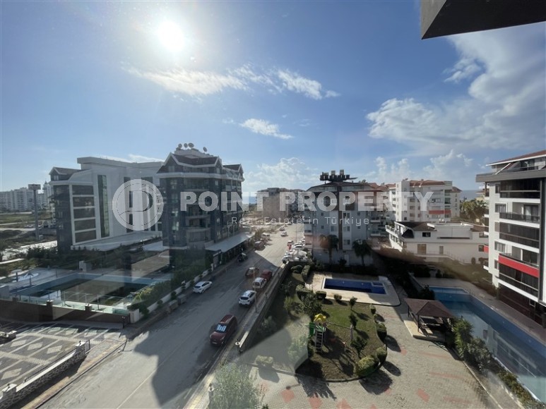 Spacious 2+1 apartment with views of the Taurus Mountains, on the 5th floor in a modern residence built in 2020-id-6851-photo-11