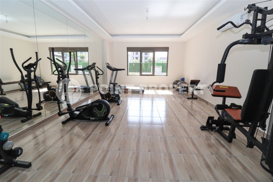 Spacious 2+1 apartment with views of the Taurus Mountains, on the 5th floor in a modern residence built in 2020-id-6851-photo-13