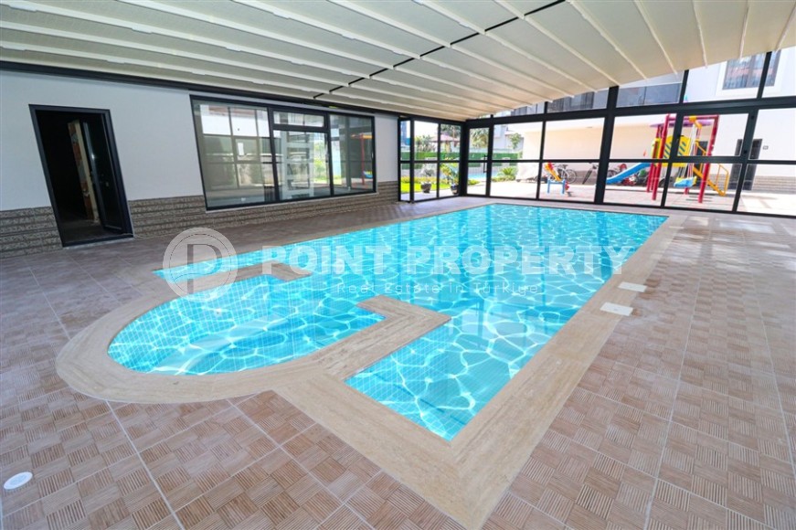 Spacious 2+1 apartment with views of the Taurus Mountains, on the 5th floor in a modern residence built in 2020-id-6851-photo-15