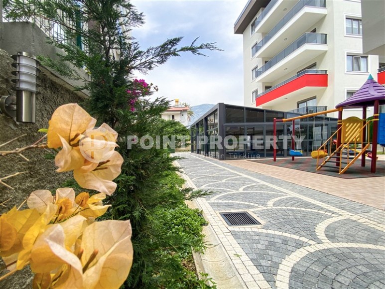 Spacious 2+1 apartment with views of the Taurus Mountains, on the 5th floor in a modern residence built in 2020-id-6851-photo-22