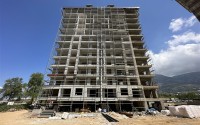 Небольшая квартира в жилом комплексе на финальном этапе строительства, в современном районе Аланьи - Махмутлар-id-6853-фото-1