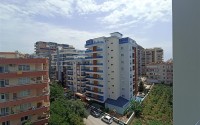 Duplex apartment on the 6th floor with an attic 300 meters from the sea, in the center of Mahmutlar-id-6859-photo-18