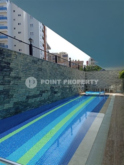 Duplex apartment on the 6th floor with an attic 300 meters from the sea, in the center of Mahmutlar-id-6859-photo-20