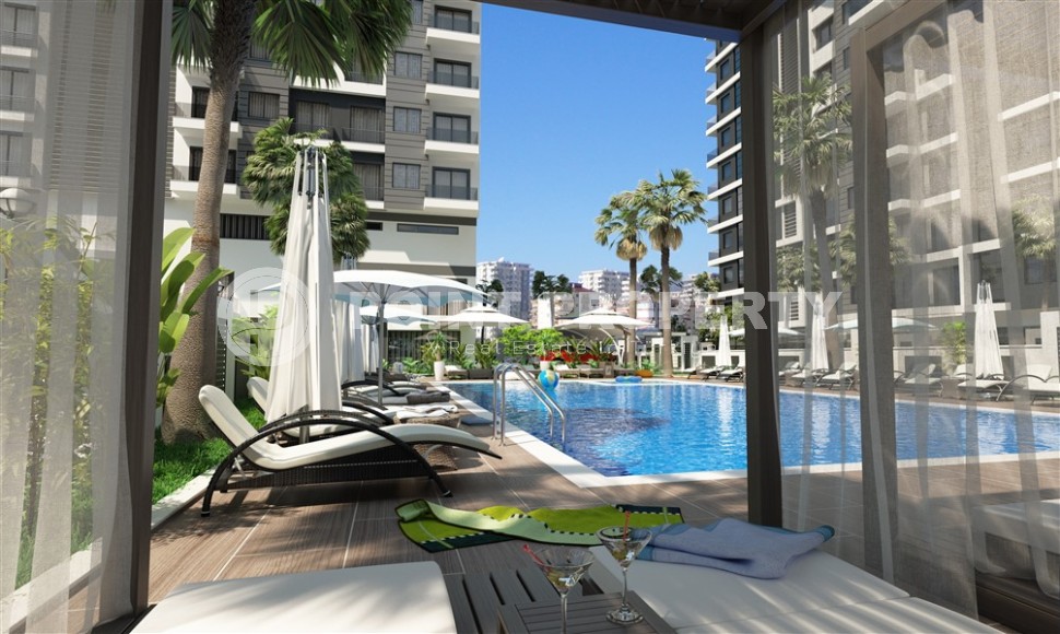 Квартира в жилом комплексе на этапе строительства в 200 метрах от моря, в центре района Махмутлар-id-6861-фото-5