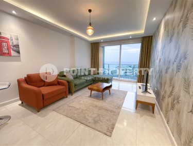 Comfortable apartment with modern design, furniture and household appliances, 200 meters from the sea, in the center of Mahmutlar-id-6863-photo-1