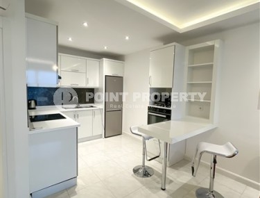 Comfortable apartment with modern design, furniture and household appliances, 200 meters from the sea, in the center of Mahmutlar-id-6863-photo-4