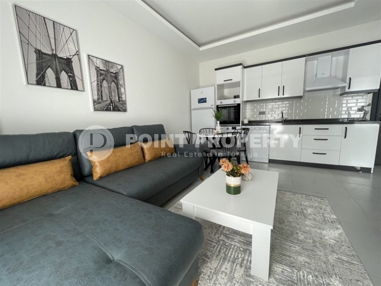 Современная квартира с новой мебелью и бытовой техникой, в 500 метрах от моря, в престижном районе Аланьи - Каргыджак-id-6870-фото-2