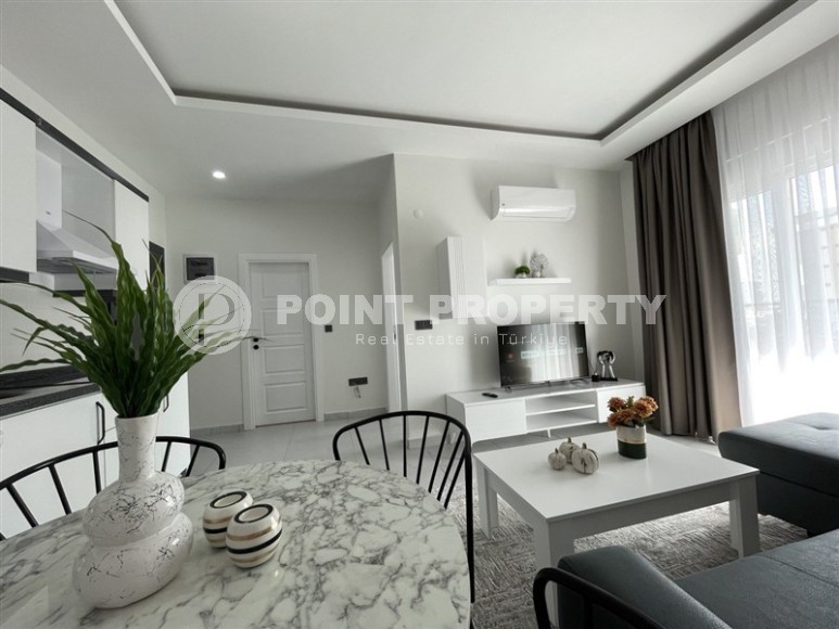 Современная квартира с новой мебелью и бытовой техникой, в 500 метрах от моря, в престижном районе Аланьи - Каргыджак-id-6870-фото-3