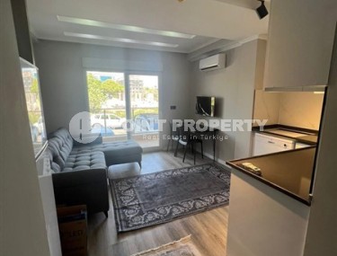 Компактная квартира 1+1, общей площадью 50 м2, на 1-м этаже в новой резиденции с бассейном и садом-id-6871-фото-2