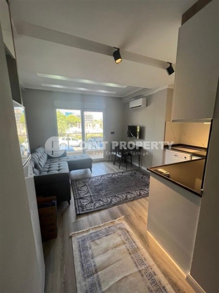 Компактная квартира 1+1, общей площадью 50 м2, на 1-м этаже в новой резиденции с бассейном и садом-id-6871-фото-2