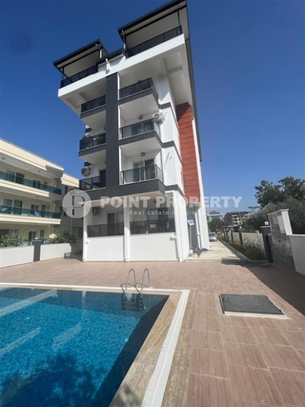 Компактная квартира 1+1, общей площадью 50 м2, на 1-м этаже в новой резиденции с бассейном и садом-id-6871-фото-6