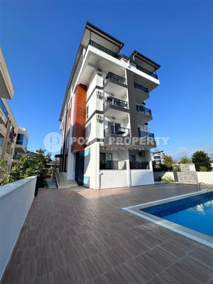 Компактная квартира 1+1, общей площадью 50 м2, на 1-м этаже в новой резиденции с бассейном и садом-id-6871-фото-7