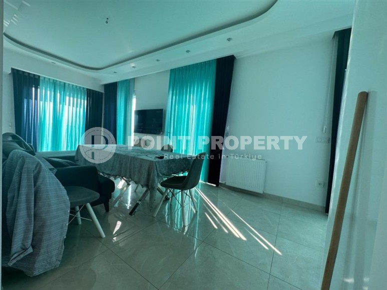 Панорамная двухуровневая квартира на 9-м этаже с мансардой, в центре современного района Аланьи - Махмутлар-id-6876-фото-1