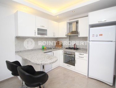 Compact apartment with high-quality renovation, modern furniture and household appliances, in the center of Mahmutlar district-id-6879-photo-4