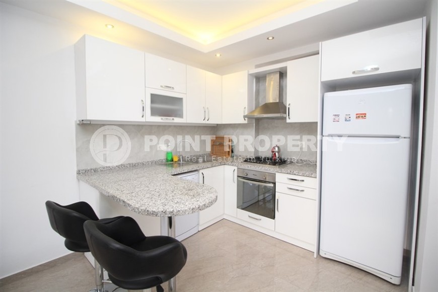 Compact apartment with high-quality renovation, modern furniture and household appliances, in the center of Mahmutlar district-id-6879-photo-4