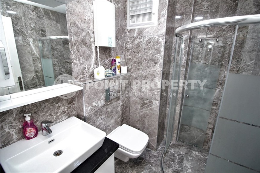 Compact apartment with high-quality renovation, modern furniture and household appliances, in the center of Mahmutlar district-id-6879-photo-7