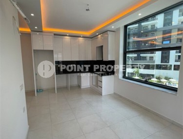 Compact new apartment 1+1, with a total area of 55 m2, on the 3rd floor in a modern residential complex with rich internal infrastructure-id-6883-photo-2