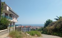 Двухуровневая квартира с видом на море и гору Кале, в престижном районе Аланьи - Хасбахче-id-6884-фото-31