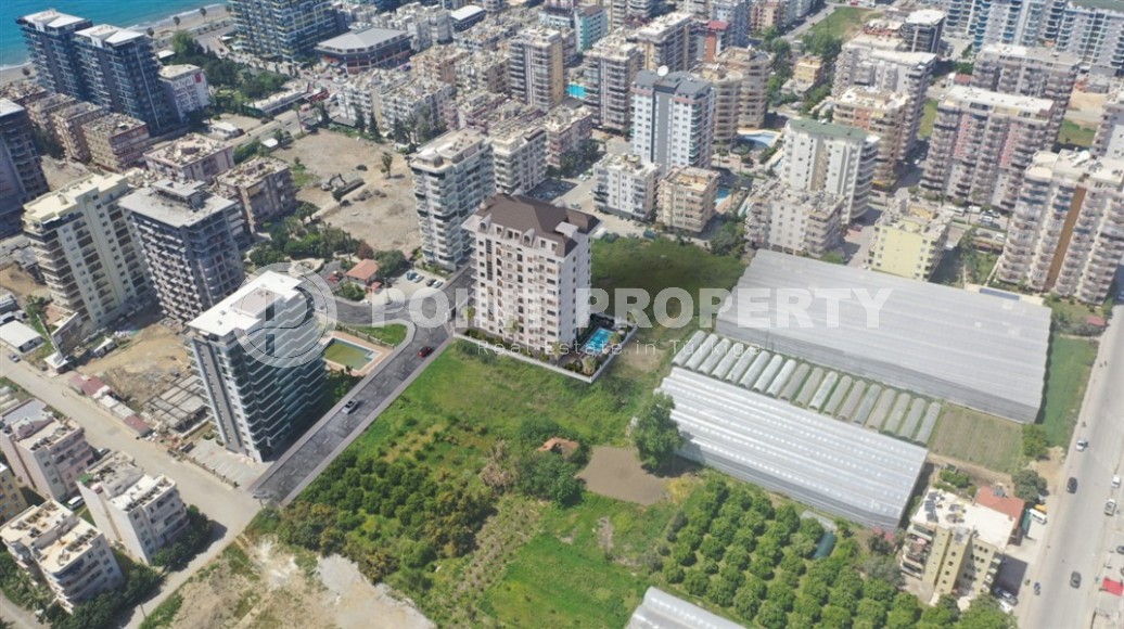 Compact 1+1 apartment in a residential complex at the final stage of construction, in the center of the modern area of Alanya - Mahmutlar-id-6899-photo-13