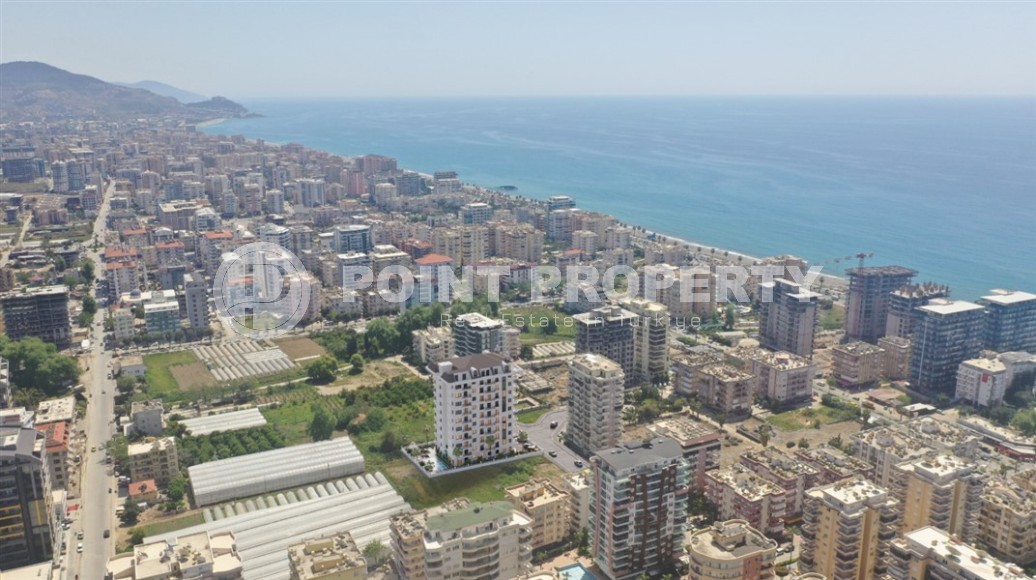 Compact 1+1 apartment in a residential complex at the final stage of construction, in the center of the modern area of Alanya - Mahmutlar-id-6899-photo-14