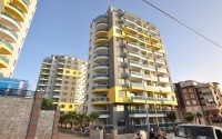 Small new apartment with fine finishing 500 meters from the beach, in the center of Mahmutlar-id-6912-photo-1