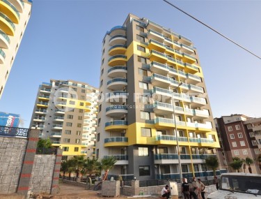 Small new apartment with fine finishing 500 meters from the beach, in the center of Mahmutlar-id-6912-photo-1