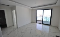 Small new apartment with fine finishing 500 meters from the beach, in the center of Mahmutlar-id-6912-photo-6