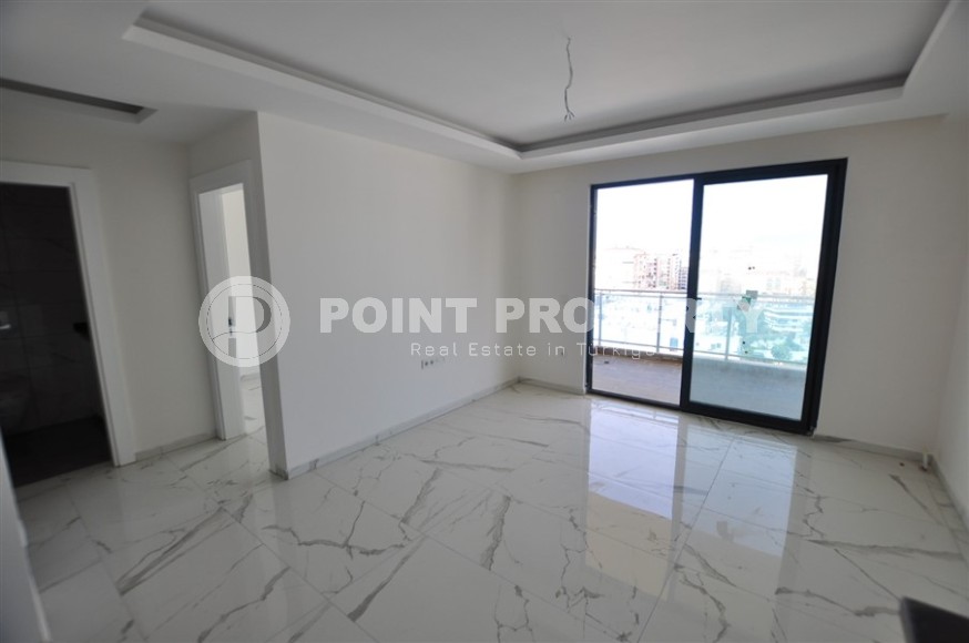 Small new apartment with fine finishing 500 meters from the beach, in the center of Mahmutlar-id-6912-photo-6