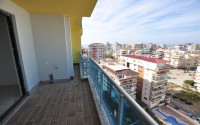 Small new apartment with fine finishing 500 meters from the beach, in the center of Mahmutlar-id-6912-photo-11