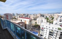 Small new apartment with fine finishing 500 meters from the beach, in the center of Mahmutlar-id-6912-photo-12